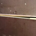 Opening tussen kistlagen